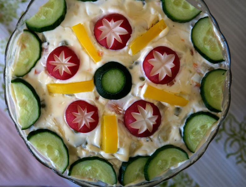 Garden fiesta salad with fresh vegetables and mango vinaigrette