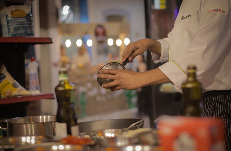 Inside Cafe Rio kitchen with freshly prepared burritos