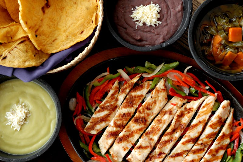 Colorful healthy salad with grains and fresh vegetables